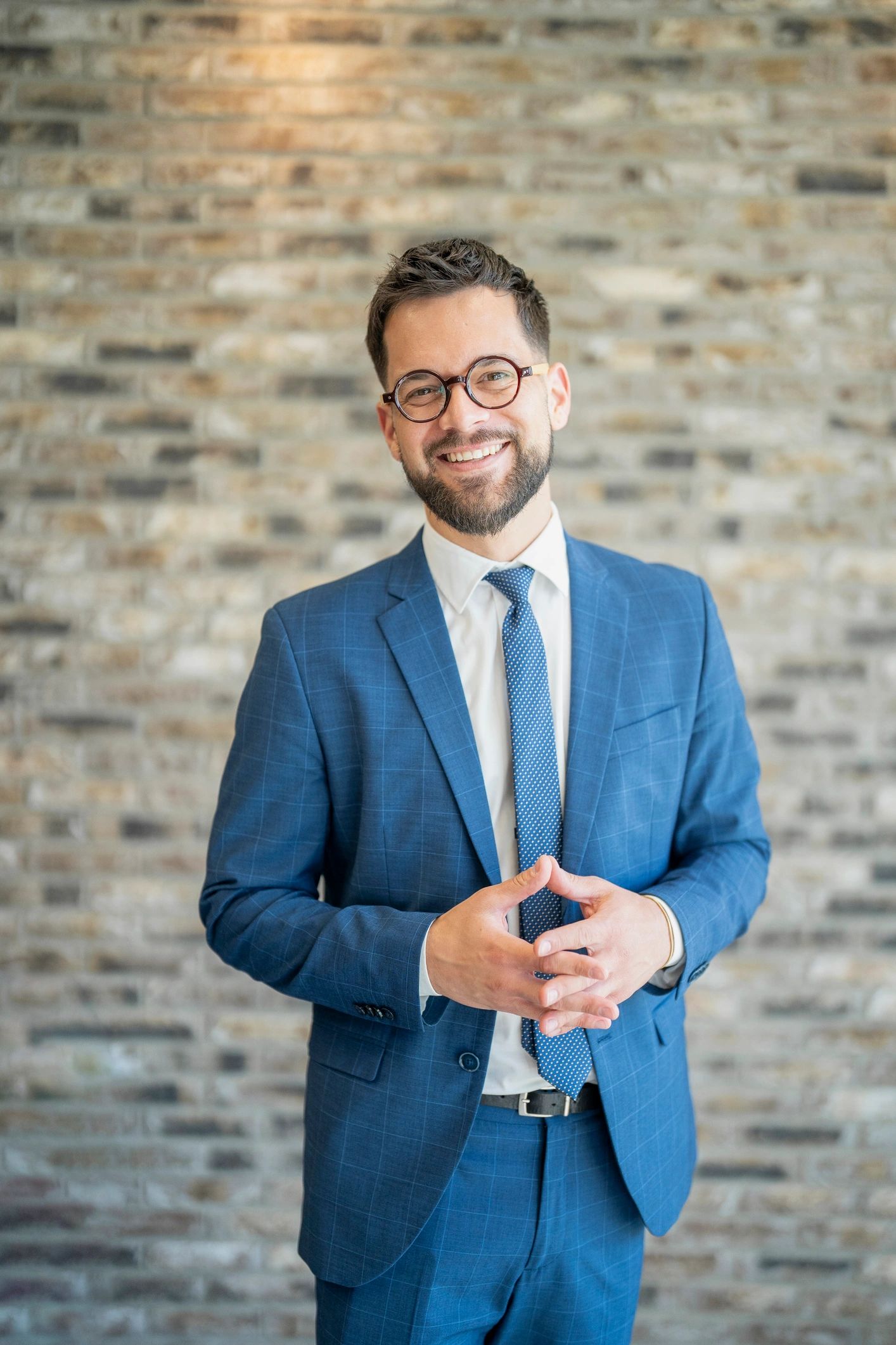 Professional portrait of market strategy lead